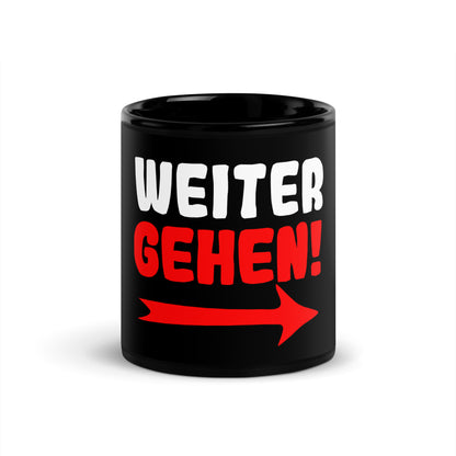 Schwarze glänzende Tasse "Weitergehen!"