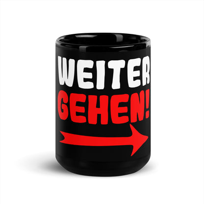 Schwarze glänzende Tasse "Weitergehen!"